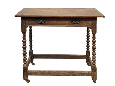 Lot 615 - A late 17th century oak side table.