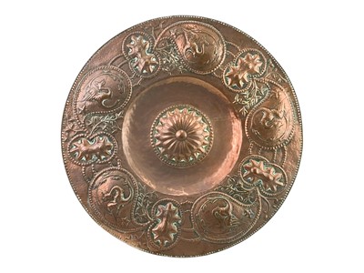 Lot 24 - An Arts and Crafts circular copper dish.