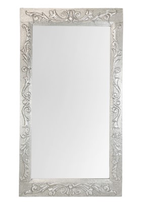 Lot 567 - An Arts and Crafts style pewter clad wall mirror.