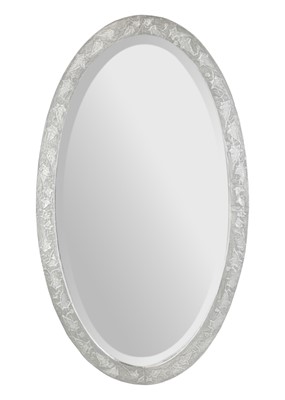 Lot 566 - An oval Arts and Crafts style pewter clad wall mirror.