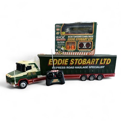 Lot 135 - Two remote-controlled Eddie Stobart toy trucks,...