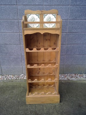 Lot 158 - This is a Sixteen-Bottle Wine Rack. It...