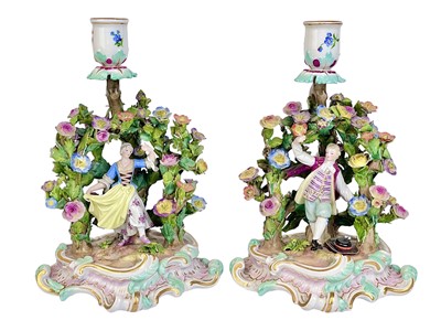 Lot 385 - A pair of Meissen candlestick figure groups.