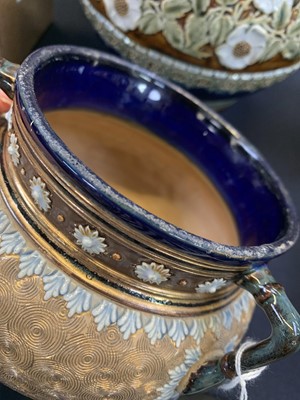 Lot 366 - A pair of Royal Doulton stoneware cauldron vases.