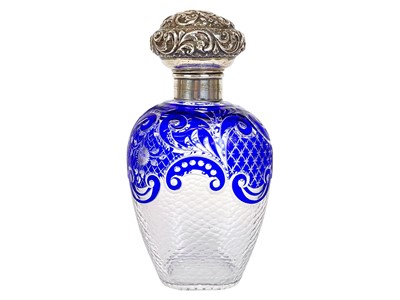 Lot 487 - A Victorian silver mounted blue overlay glass scent bottle.