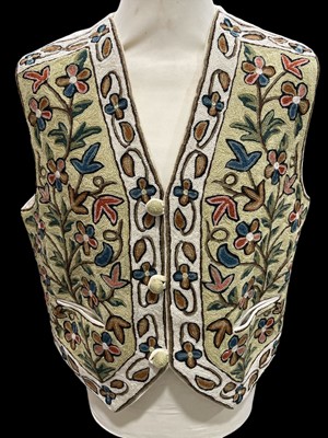 Lot 197 - A Cotton Waistcoat with Knitted front panels....