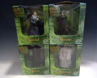 Lot 200 - Four Lord of the Rings Figures, boxed. The...