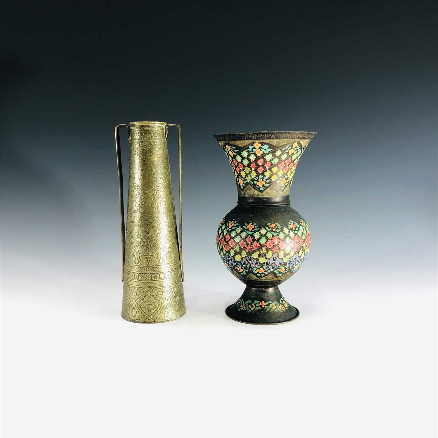 Lot 706 A 'Kinco' Islamic brass twin handled vase,
