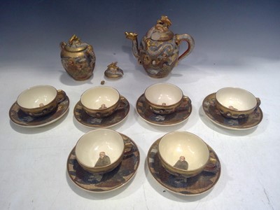 Lot 238 - A Vintage, Satsuma Tea Service. There is...