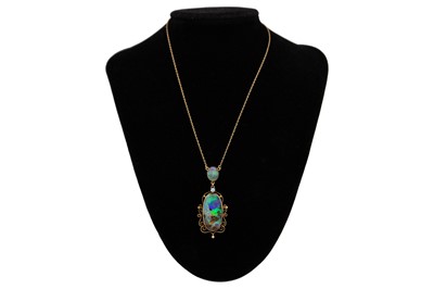 Lot 32 - A good 9k gold black boulder opal pendant necklace.