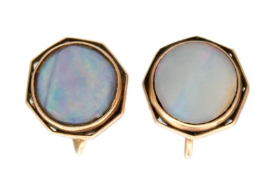 Lot 40 - A pair of round cabochon opal earrings in 9k rose gold.