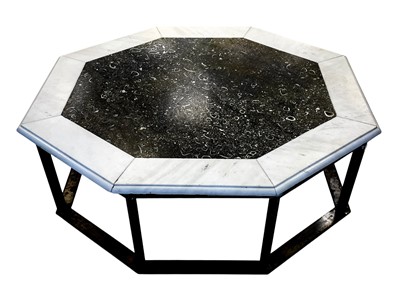 Lot 1091 - An octagonal polished fossil bed coffee table.