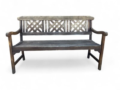 Lot 1225 - A hardwood garden bench.