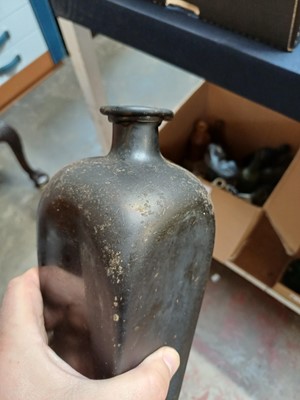 Lot 38 - 15 assorted glass bottles and two stoneware jars.