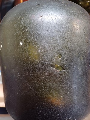 Lot 38 - 15 assorted glass bottles and two stoneware jars.