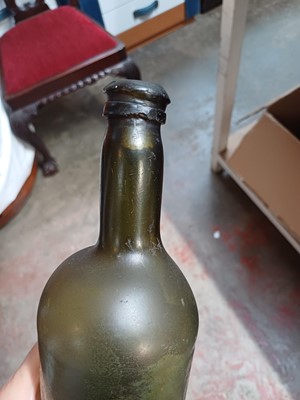 Lot 38 - 15 assorted glass bottles and two stoneware jars.