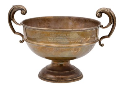 Lot 73 - A George V silver twin handled pedestal trophy cup.