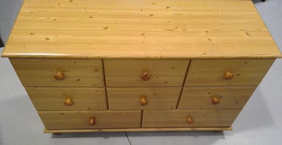 Lot 67 - A Pine effect, Chest of Drawers. The Chest...