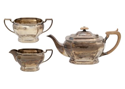 Lot 86 - A George VI silver three piece tea set by Cooper Brothers & Sons Ltd.