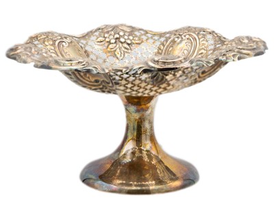 Lot 88 - An Edwardian silver pierced and embossed pedestal basket by James Dixon & Sons Ltd.