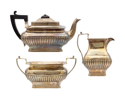 Lot A Victorian silver three-piece tea set retailed by Watherston London.