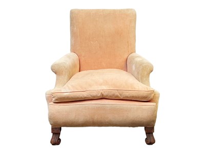 Lot 705 - A salmon pink velvet upholstered armchair.