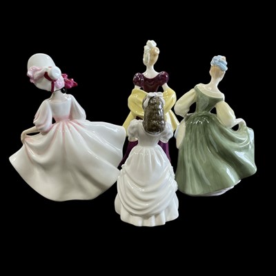 Lot 59 - Four Royal Doulton figures. Birthday Girl,...