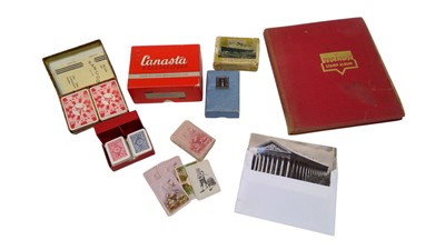 Lot 70 - Playing cards, postcards, and a stamp album.