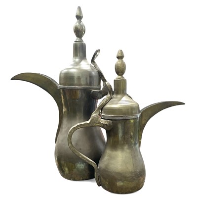 Lot 88 - Two vintage brass Dallah coffee pots the...