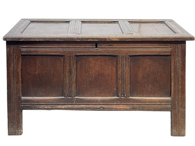 Lot 613 - An 18th century oak triple panel coffer.