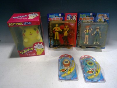 Lot 12 - A Plush, Electronic Pikachu, Two Pokemon...