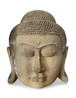 Lot 1222 - A large reconstituted stone Buddha head