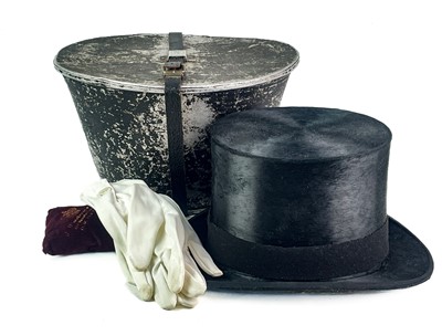 Lot 284 - A Dunn & Co top hat in a painted tin box.