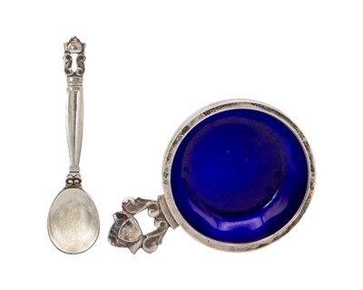 Lot 152 - GEORG JENSEN - A Danish silver and blue enamel Acorn pattern salt cellar and spoon.