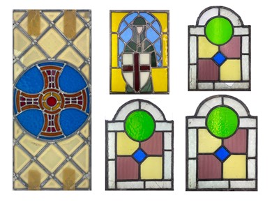 Lot 52 - A group of three Edwardian arched stained and leaded glass panels.