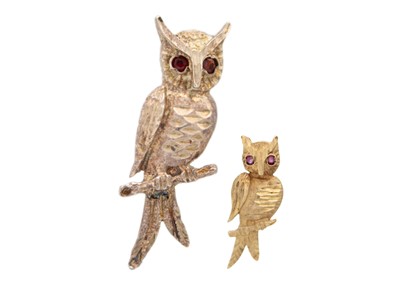 Lot 83 - A 9ct owl pendant with pink sapphire eyes and a silver owl brooch with garnet eyes.