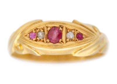 Lot 23 - An Edwardian 18k gold ruby and diamond ring.