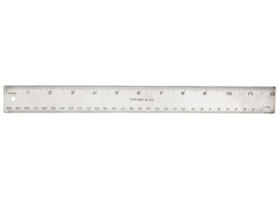 Lot 186 - A Tiffany & Co silver ruler in an original box.