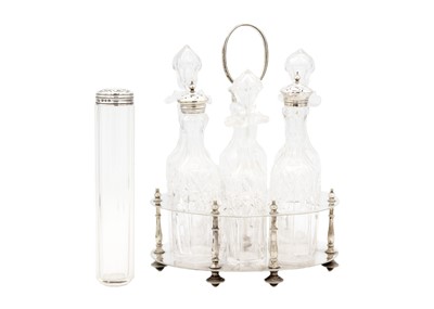 Lot 238 - Six bottled silver plated cruet and silver-topped jar.