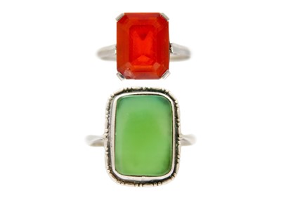 Lot 99 - A Fire opal platinum solitaire ring, with jade cabochon silver solitaire ring.