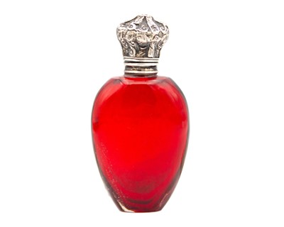 Lot 264 - A silver-mounted ruby glass perfume bottle.