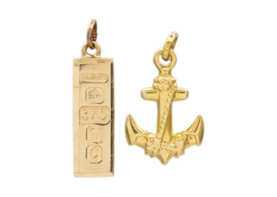 Lot 28 - A selection of two gold pendants/charms.