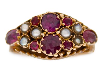 Lot 44 - A Victorian 9k garnet, ruby, and split pearl set, closed-back ring.