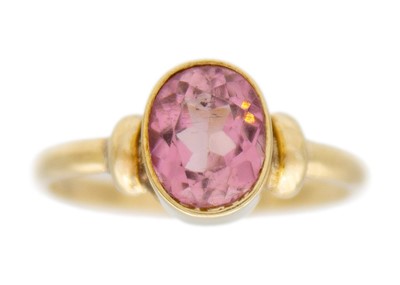 Lot 46 - A 14k gold pink tourmaline solitaire ring.