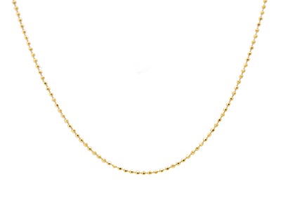 Lot 68 - An 18k gold faceted bead link chain.