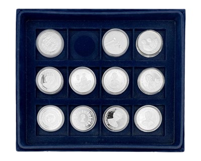 Lot 70 - A collection of nine Westminster silver proof Royal Commemorative £5 coins.