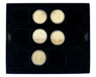 Lot 57 - A Royal Mint 'Historic coins of Great Britain' set of five silver gilt proof crown coins.