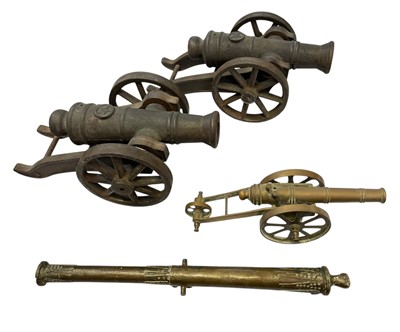 Lot 162 - A pair of heavy cast iron models of cannon.