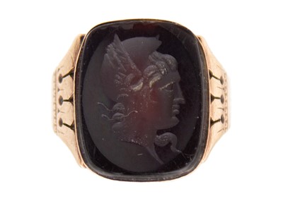 Lot 81 - A late Victorian high-purity gold garnet intaglio signet ring.