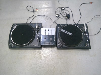 Lot 27 - A Numark, DJ in a Box. The Turntables run but...